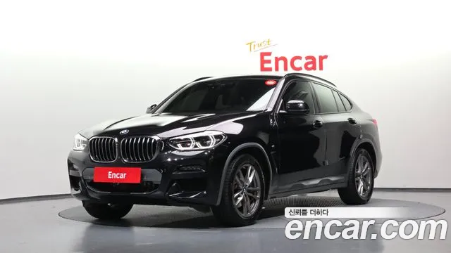 BMW X4 2021 — photo 1