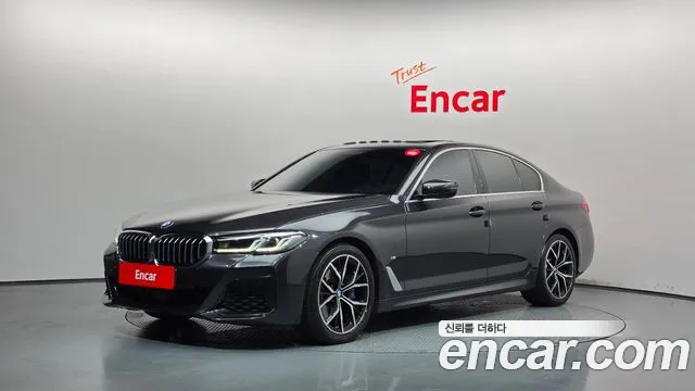 BMW 5-Series 2021 — photo 1