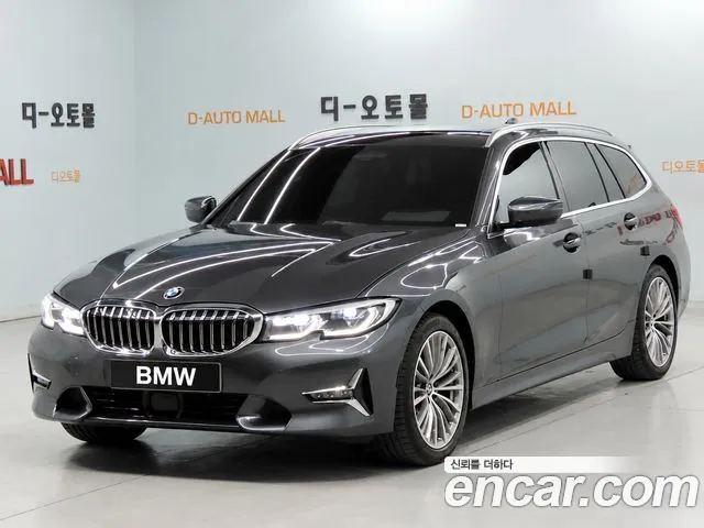 BMW 3-Series 2022 — photo 1