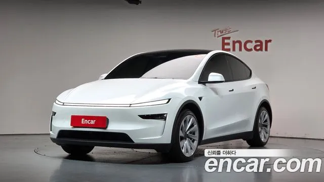 Tesla Model Y 2025 — photo 1