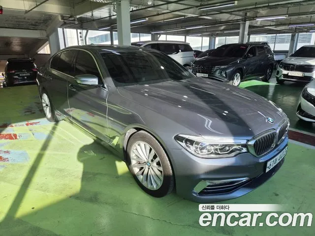 BMW 5-Series 2018 — photo 1