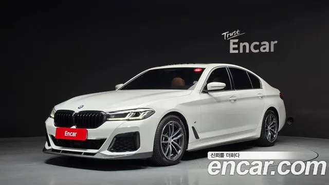 BMW 5-Series 2023 — photo 1