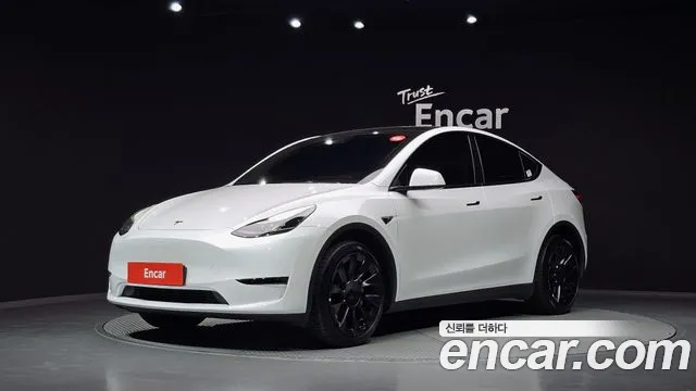Tesla Model Y 2024 — photo 1