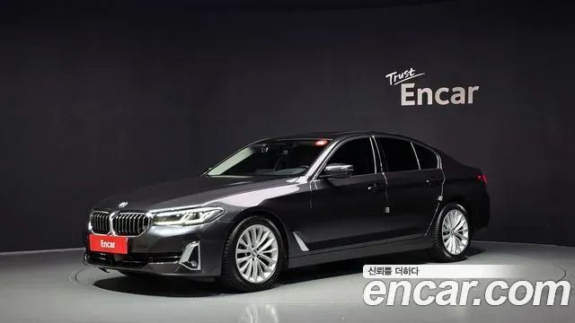 BMW 5-Series 2022 — photo 1