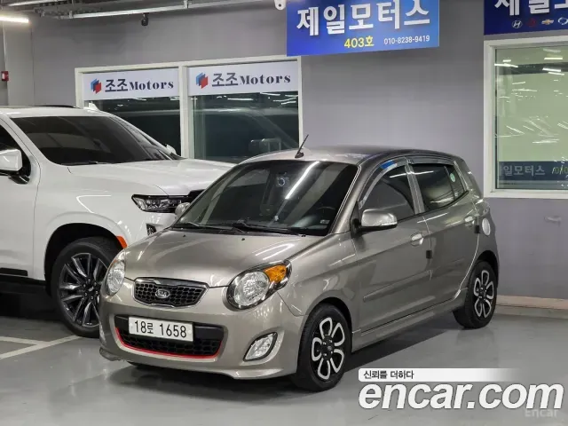 Kia morning 2011 — photo 1