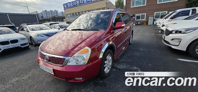 Kia Canival 2012 — photo 1