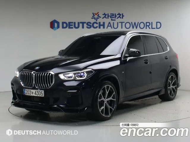 BMW X5 2022 — photo 1