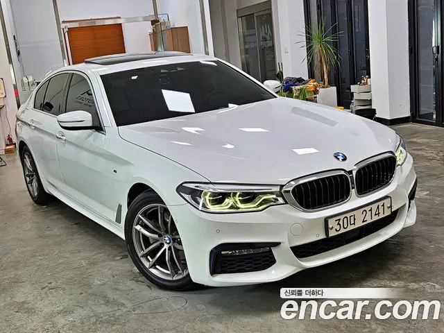 BMW 5-Series 2018 — photo 1