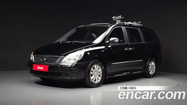 Kia Canival 2012 — photo 1