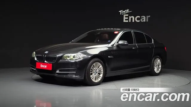 BMW 5-Series 2015 — photo 1