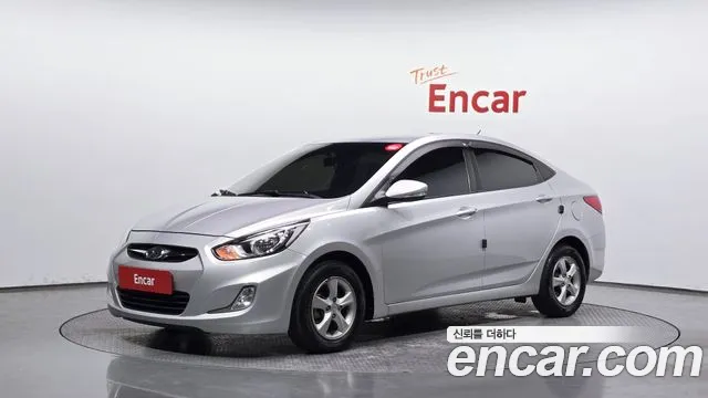 Hyundai Accent 2012 — photo 1