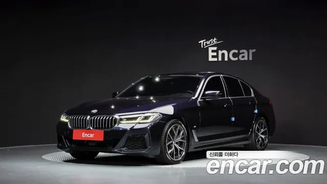 BMW 5-Series 2023 — photo 1
