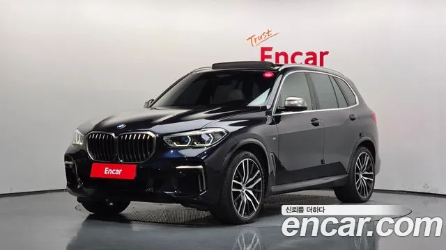 BMW X5 2022 — photo 1