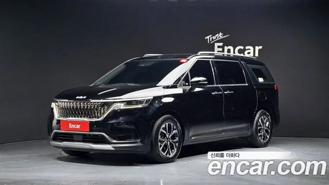 Kia Canival 2023 — photo 1