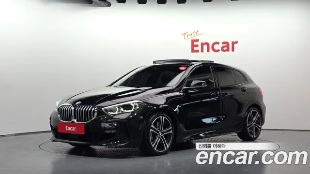 BMW 1-Series 2023 — photo 1