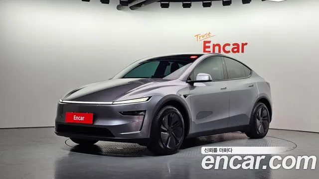 Tesla Model Y 2025 — photo 1