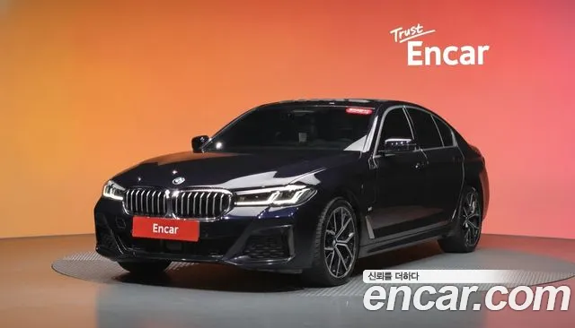 BMW 5-Series 2021 — photo 1