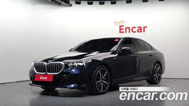 BMW 5-Series 2024 — photo 1
