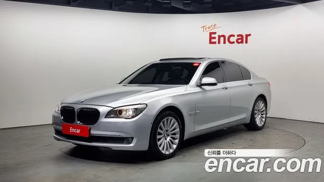 BMW 7-Series 2011 — photo 1