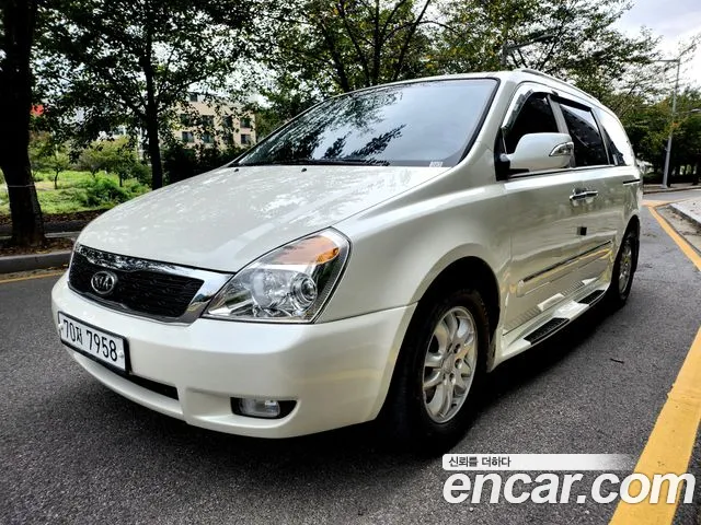 Kia Canival 2011 — photo 1