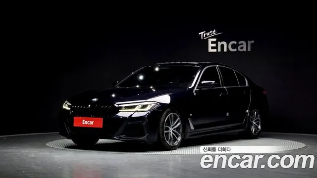 BMW 5-Series 2023 — photo 1