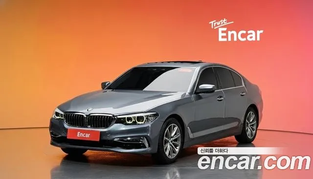 BMW 5-Series 2018 — photo 1