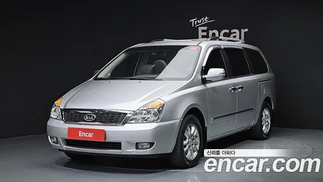 Kia Canival 2011 — photo 1