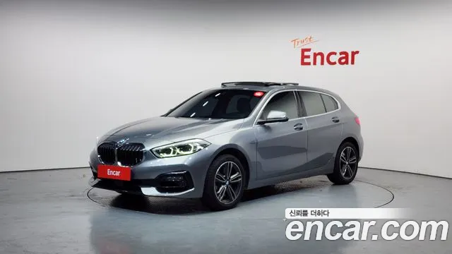 BMW 1-Series 2023 — photo 1