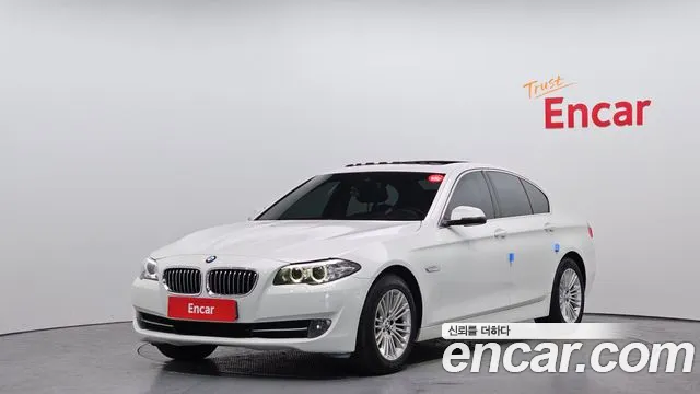 BMW 5-Series 2014 — photo 1