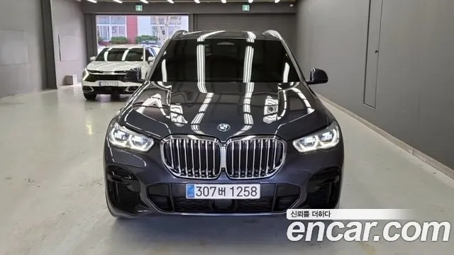 BMW X5 2022 — photo 1