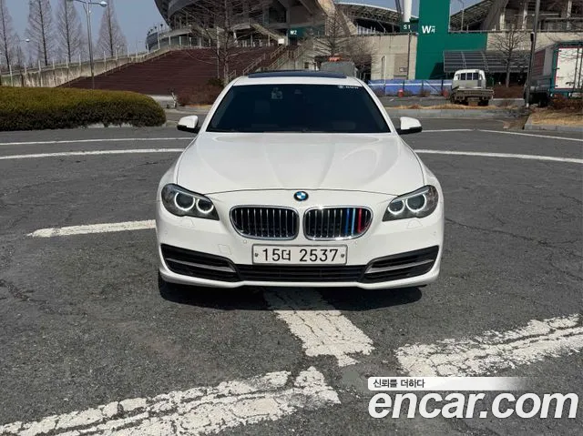 BMW 5-Series 2014 — photo 1
