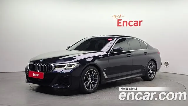 BMW 5-Series 2021 — photo 1