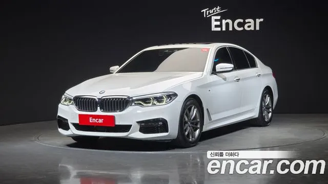 BMW 5-Series 2018 — photo 1