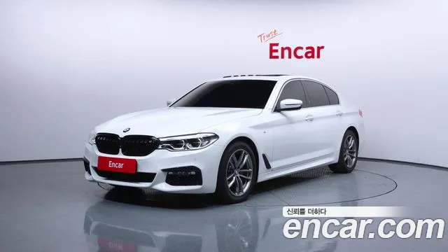 BMW 5-Series 2018 — photo 1