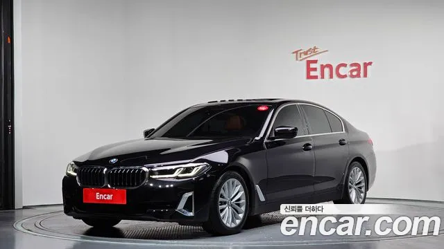 BMW 5-Series 2022 — photo 1