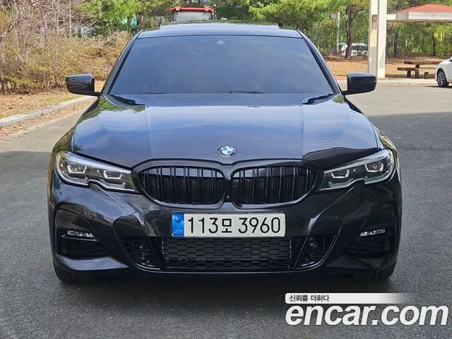 BMW 3-Series 2022 — photo 1