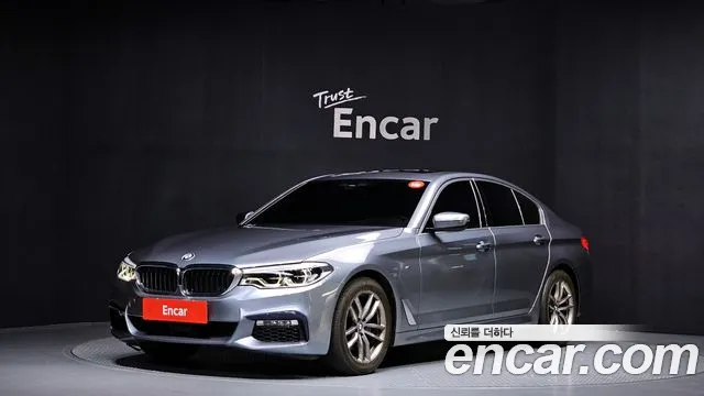 BMW 5-Series 2018 — photo 1
