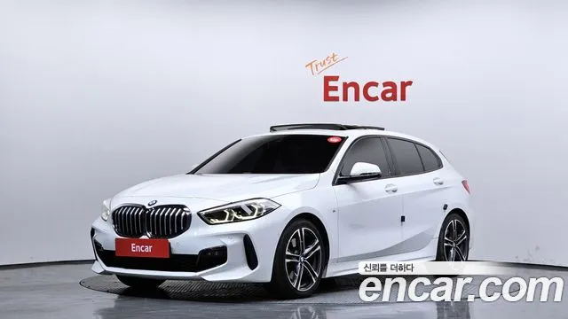 BMW 1-Series 2022 — photo 1
