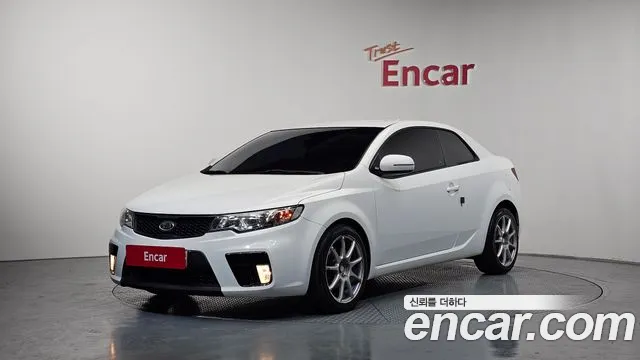 Kia Porte 2011 — photo 1