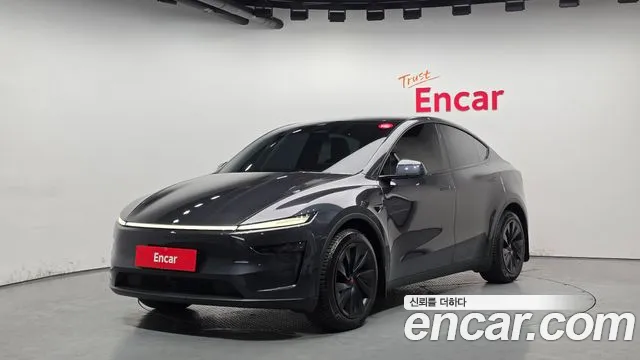 Tesla Model Y 2025 — photo 1