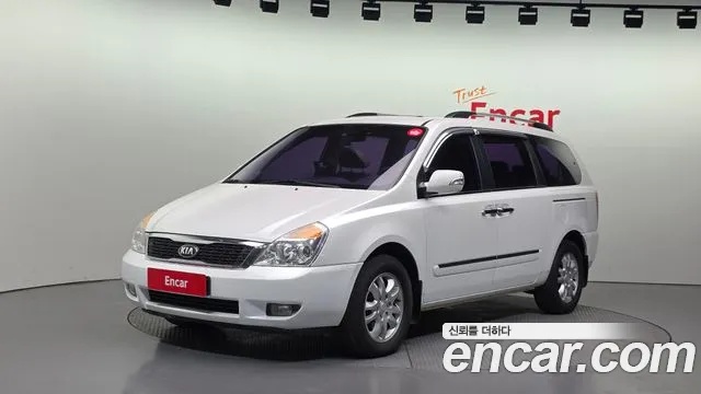 Kia Canival 2013 — photo 1