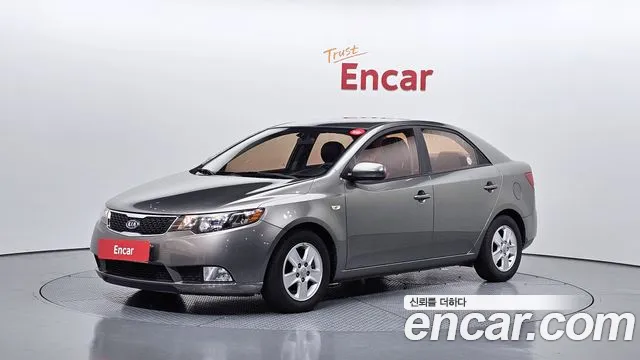 Kia Porte 2011 — photo 1