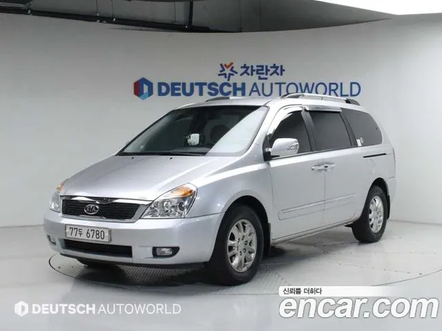 Kia Canival 2011 — photo 1