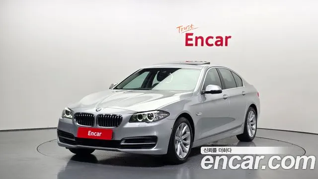 BMW 5-Series 2015 — photo 1