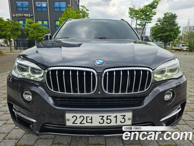BMW X5 2014 — photo 1