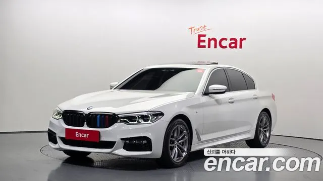BMW 5-Series 2018 — photo 1