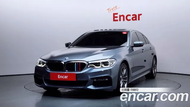 BMW 5-Series 2018 — photo 1