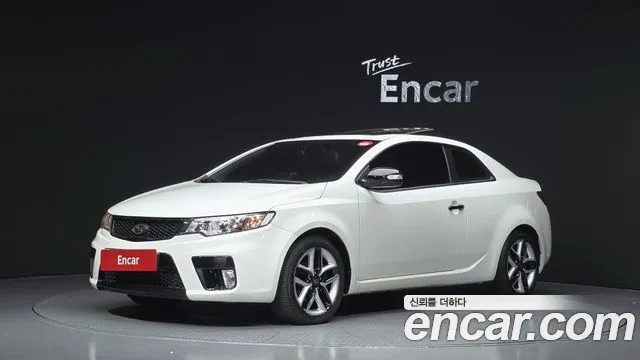 Kia Porte 2010 — photo 1