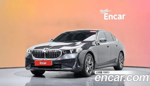 BMW 5-Series 2024 — photo 1