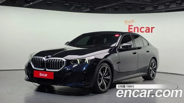 BMW 5-Series 2024 — photo 1